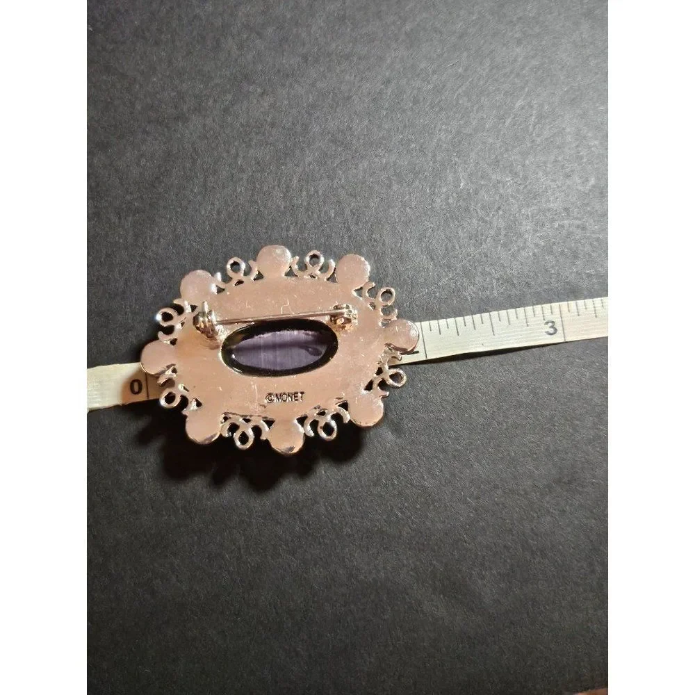 Monet vintage purple rhinestone brooch